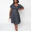 Unique Vintage Curve 1950s Black Tulip Pin Dot Swing Dress